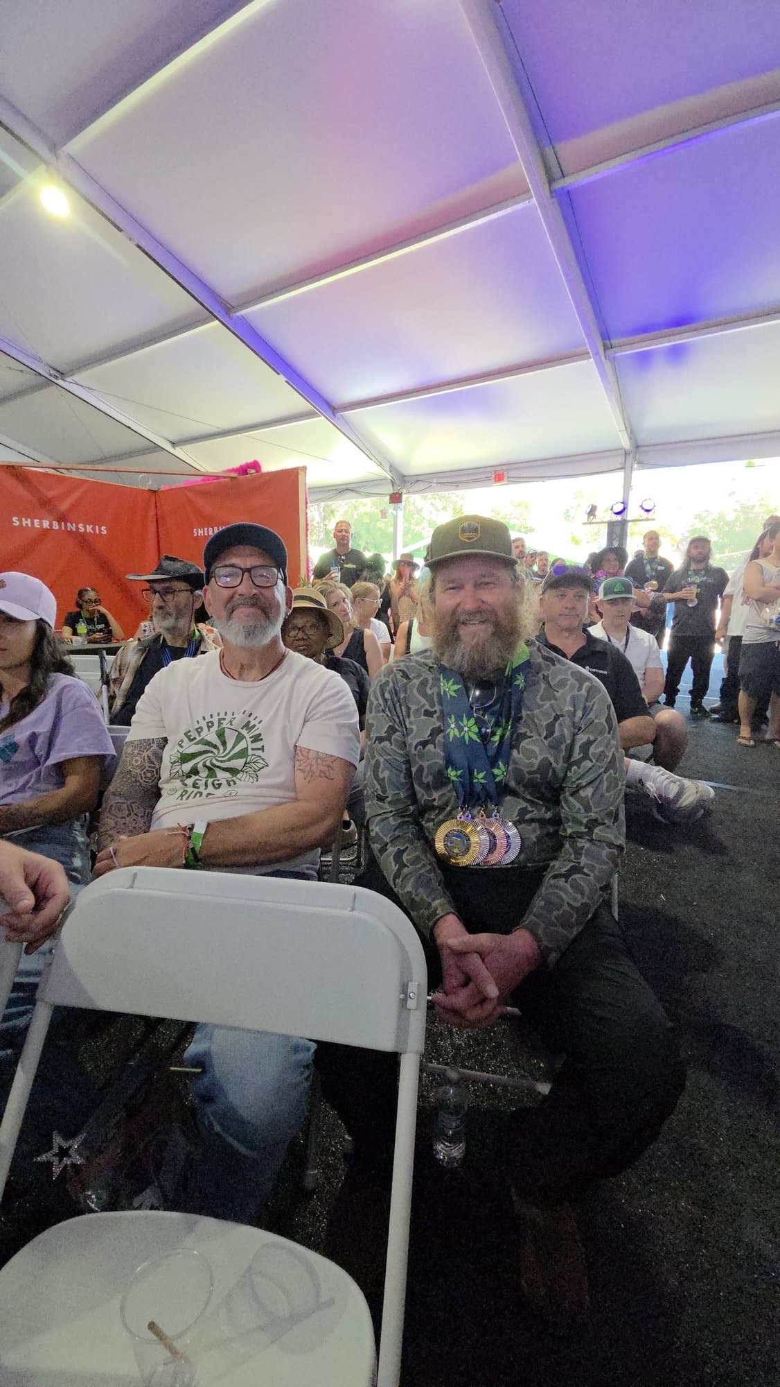 Mark Greyshock with medals at the awards tent